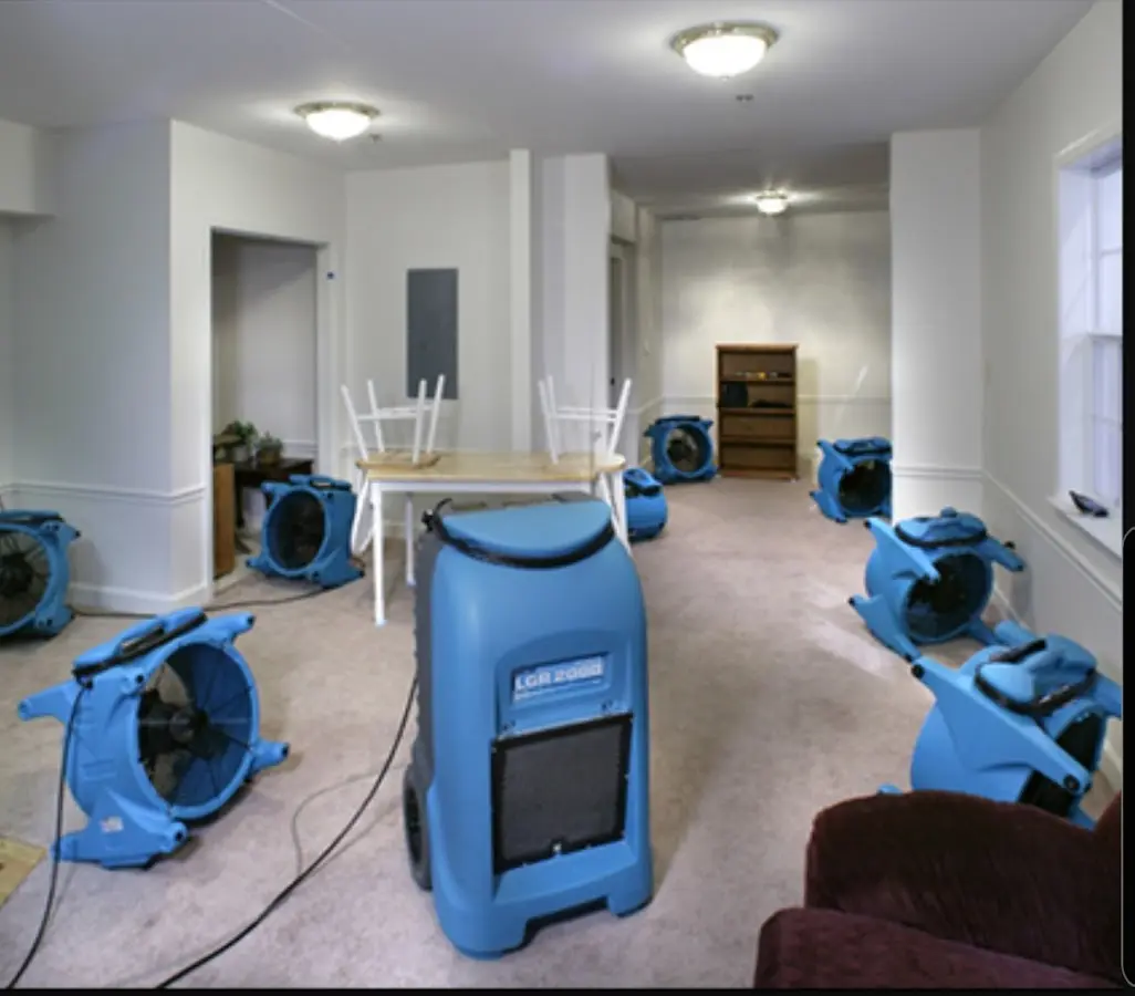 Air movers and dehumidifier setup for Water Extraction & Removal in Forest City